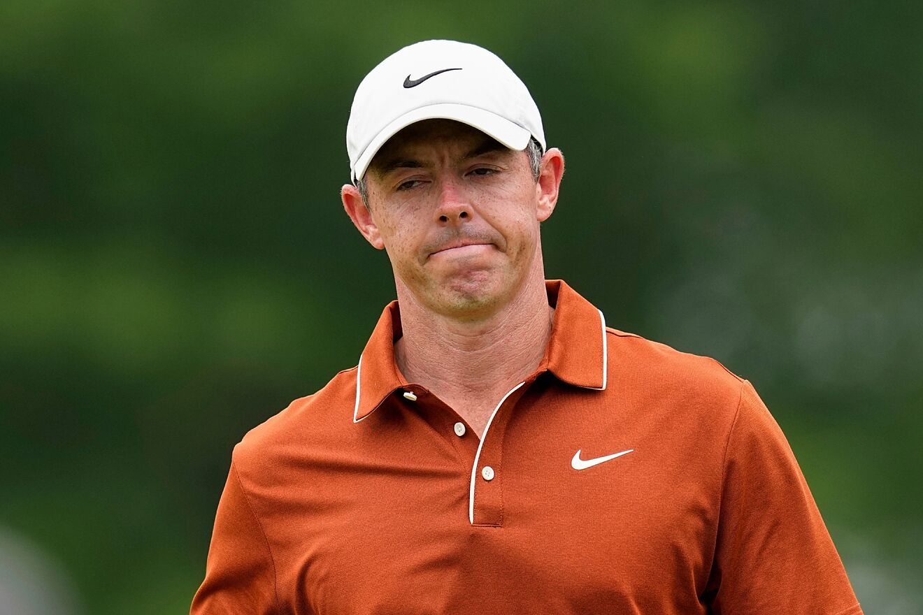 Rory McIlroy walks on the third hole during the second round of the...