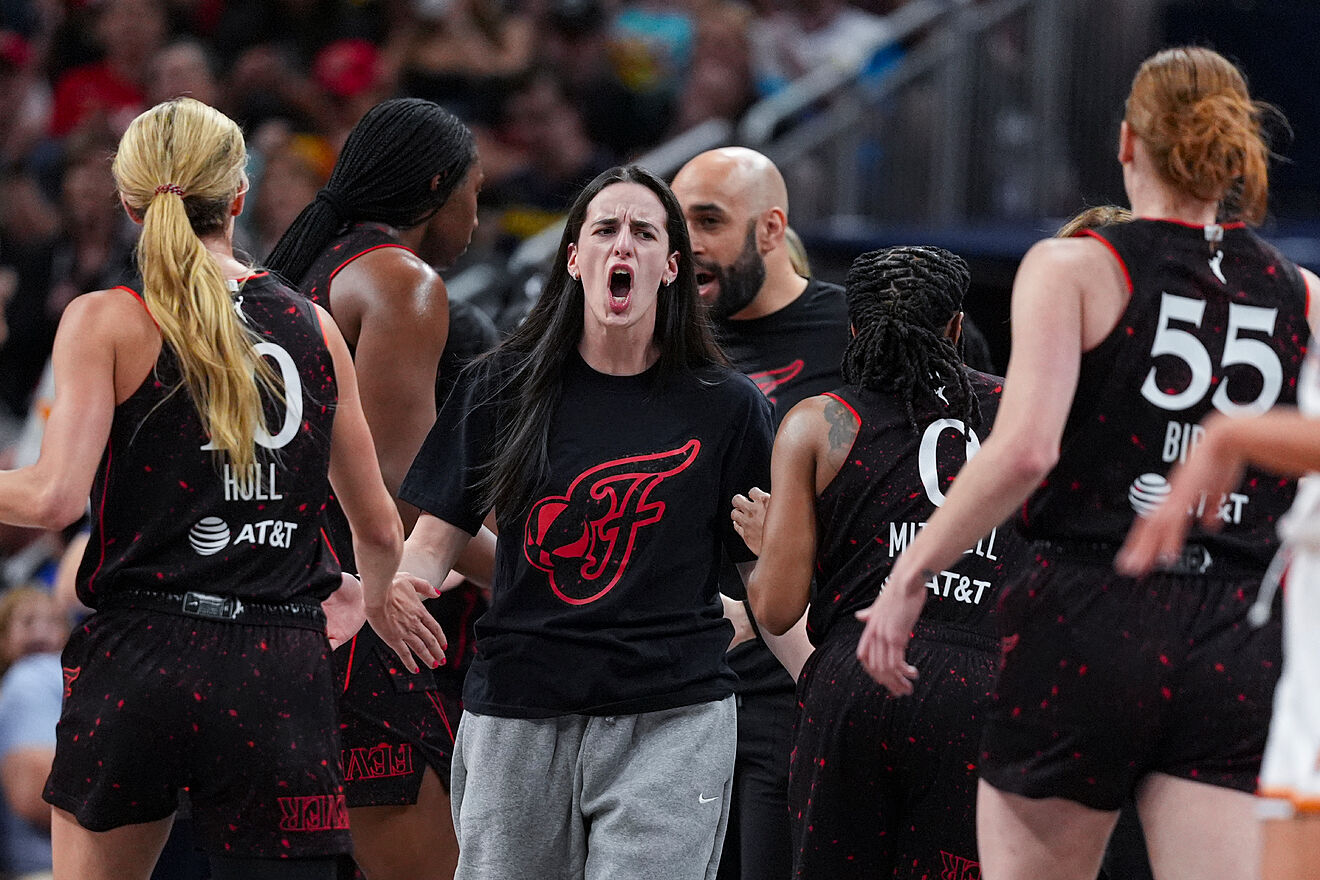 Indiana Fever guard Caitlin Clark, celebrates with teammate against...