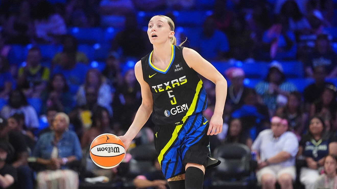 Dallas Wings guard Paige Bueckers; (5) dribbles during the first half...