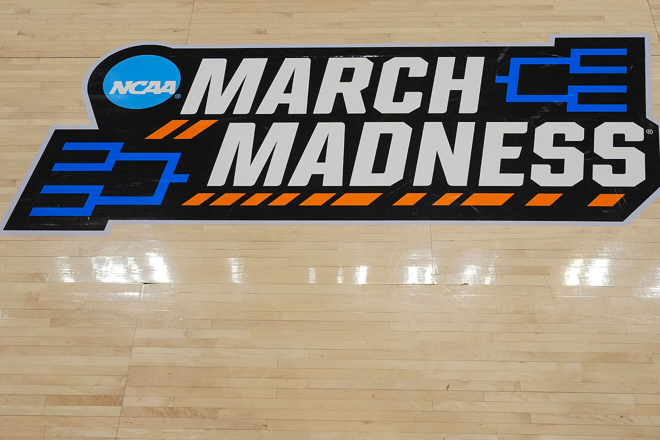 The March Madness logo adorns the court during the first round of the...