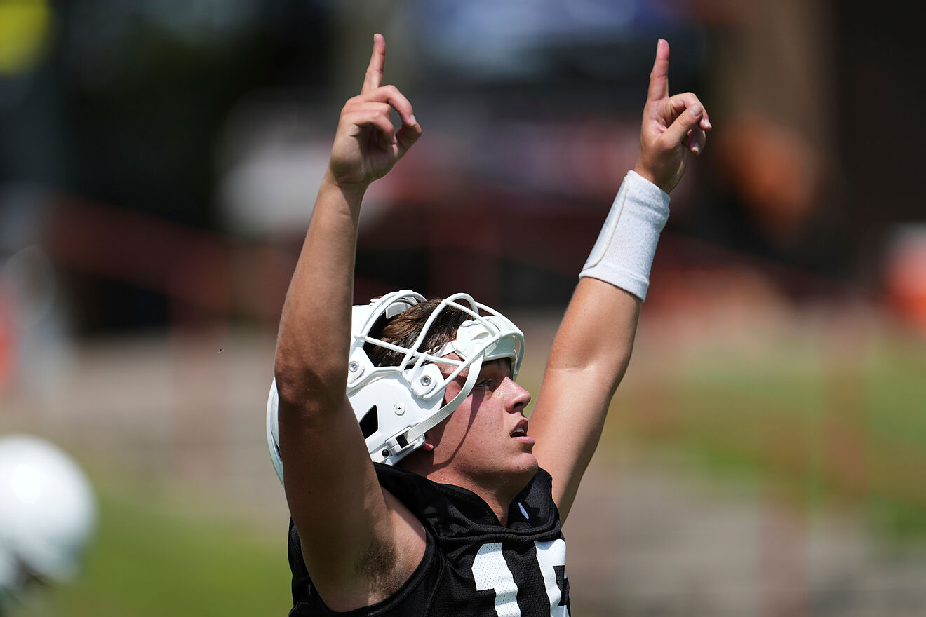 Texas quarterback Arch Manning (16) reacts during an NCAA college...