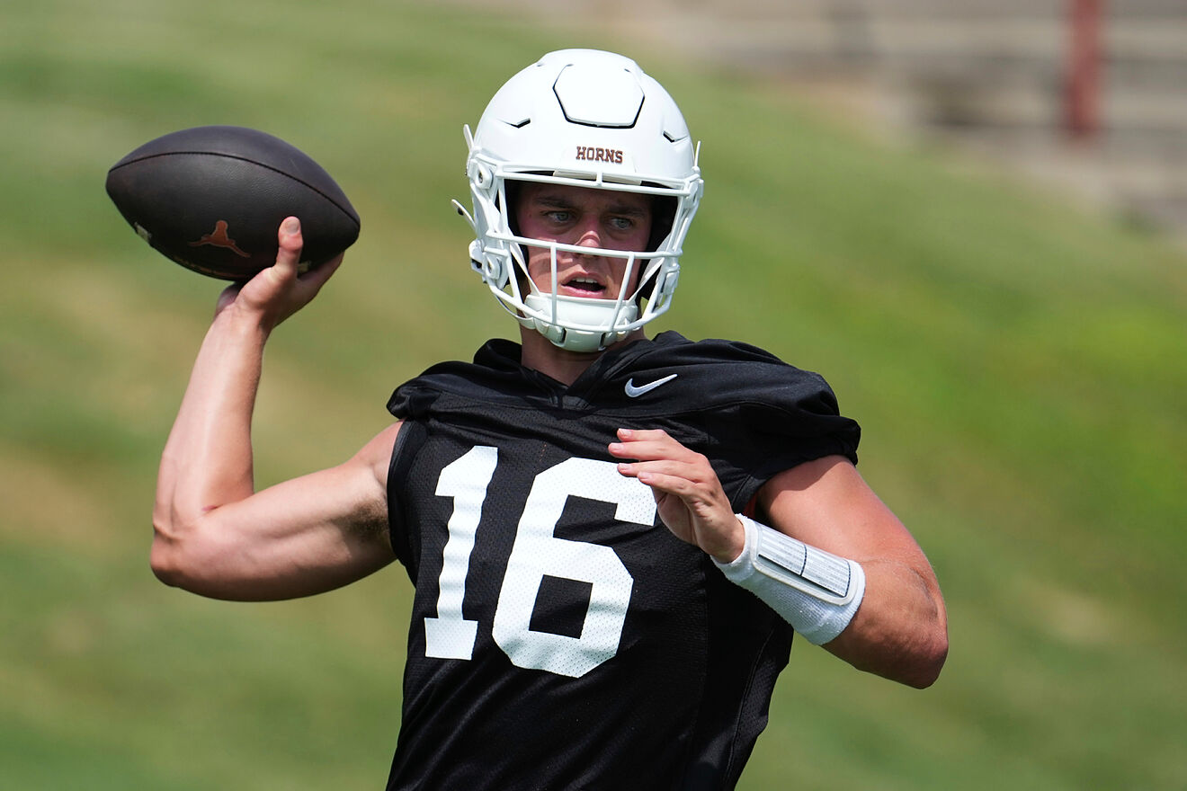 Texas quarterback Arch Manning (16) throws during an NCAA college...