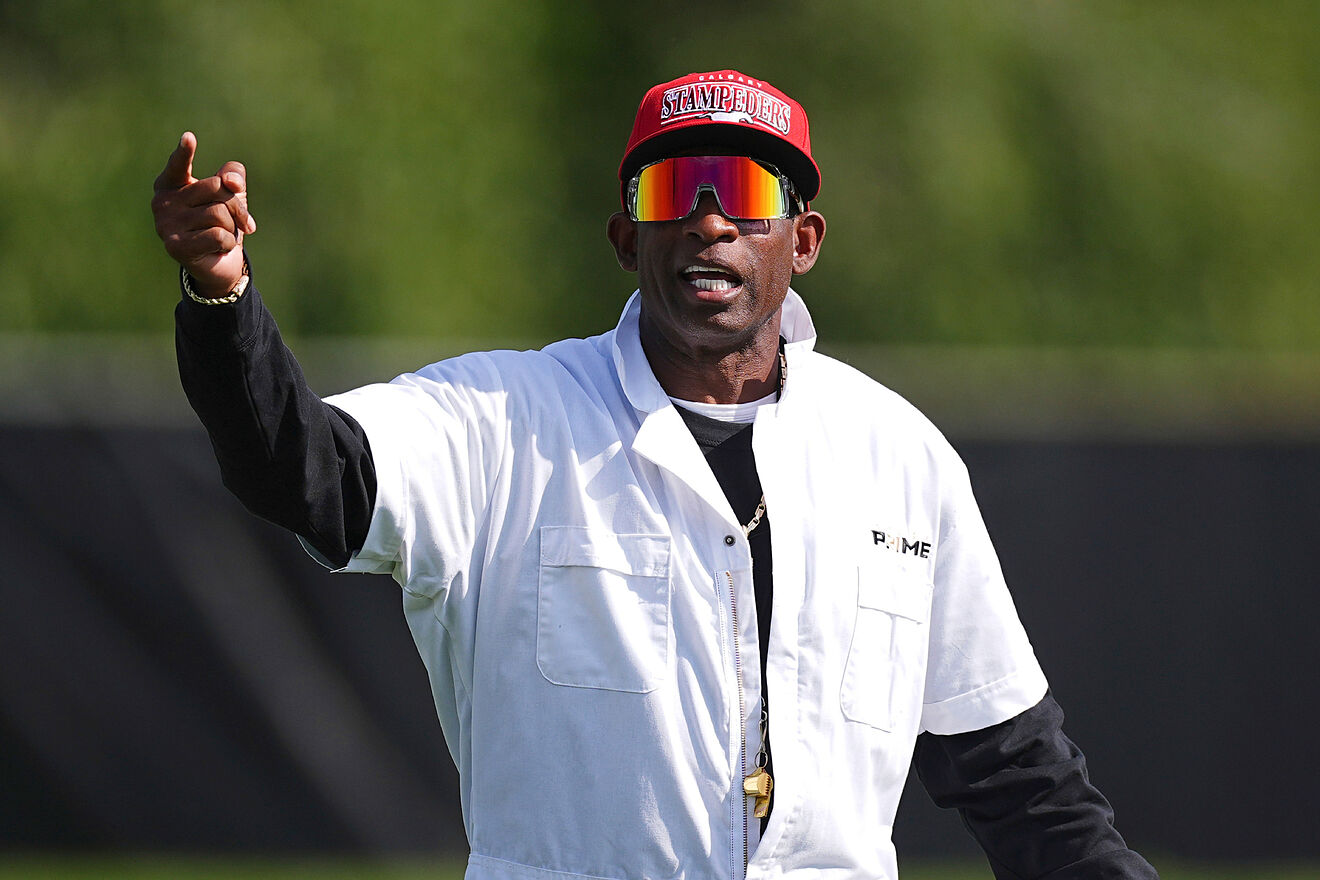 Colorado head coach Deion Sanders directs players during an NCAA...